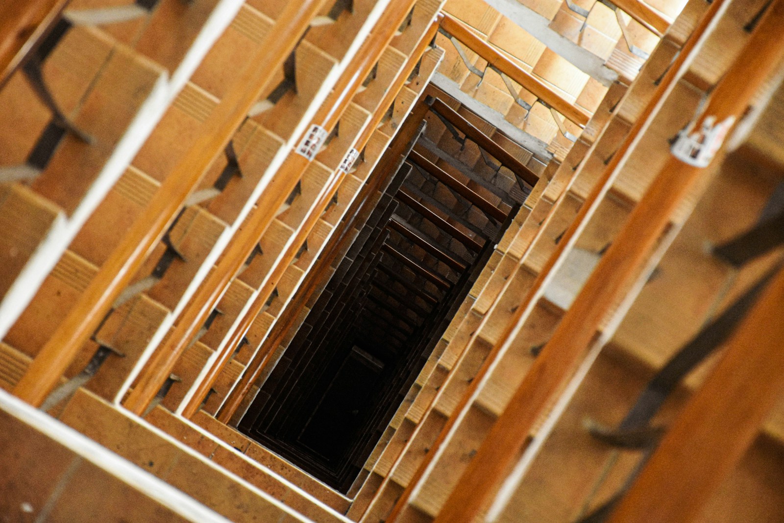 a room filled with lots of wooden boxes