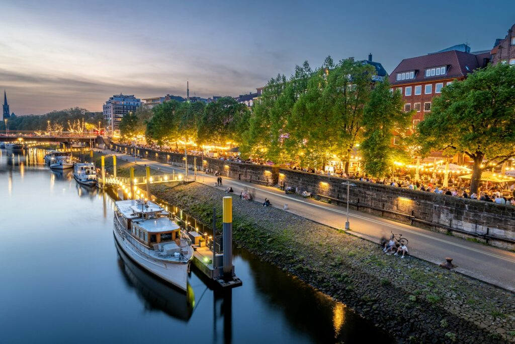 A river that has a bunch of boats in it